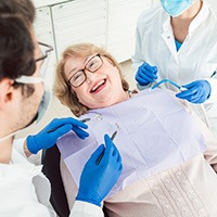 Woman smiling in the dental chair